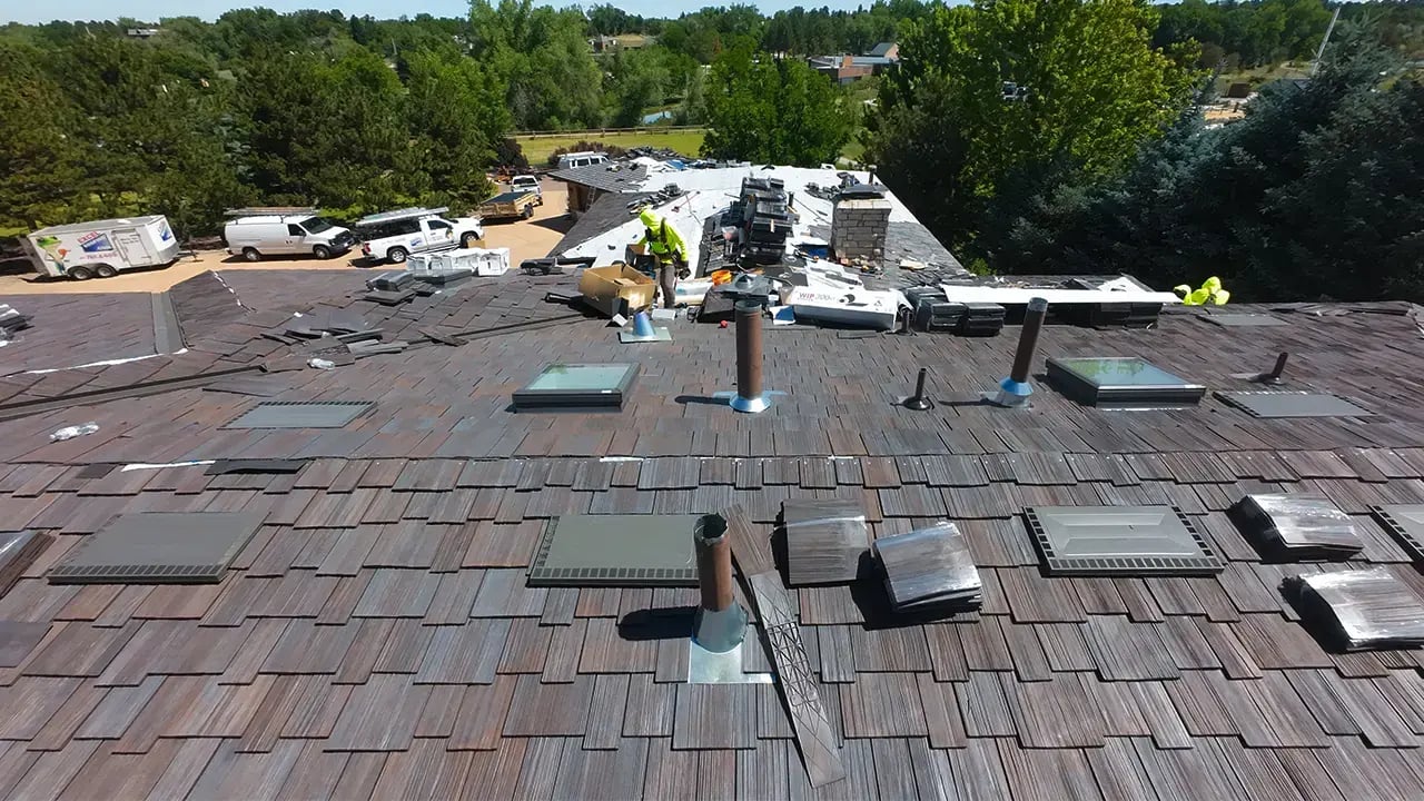 Cherry Hill Clorado home with a Brava synthetic cedar shake roof being installed