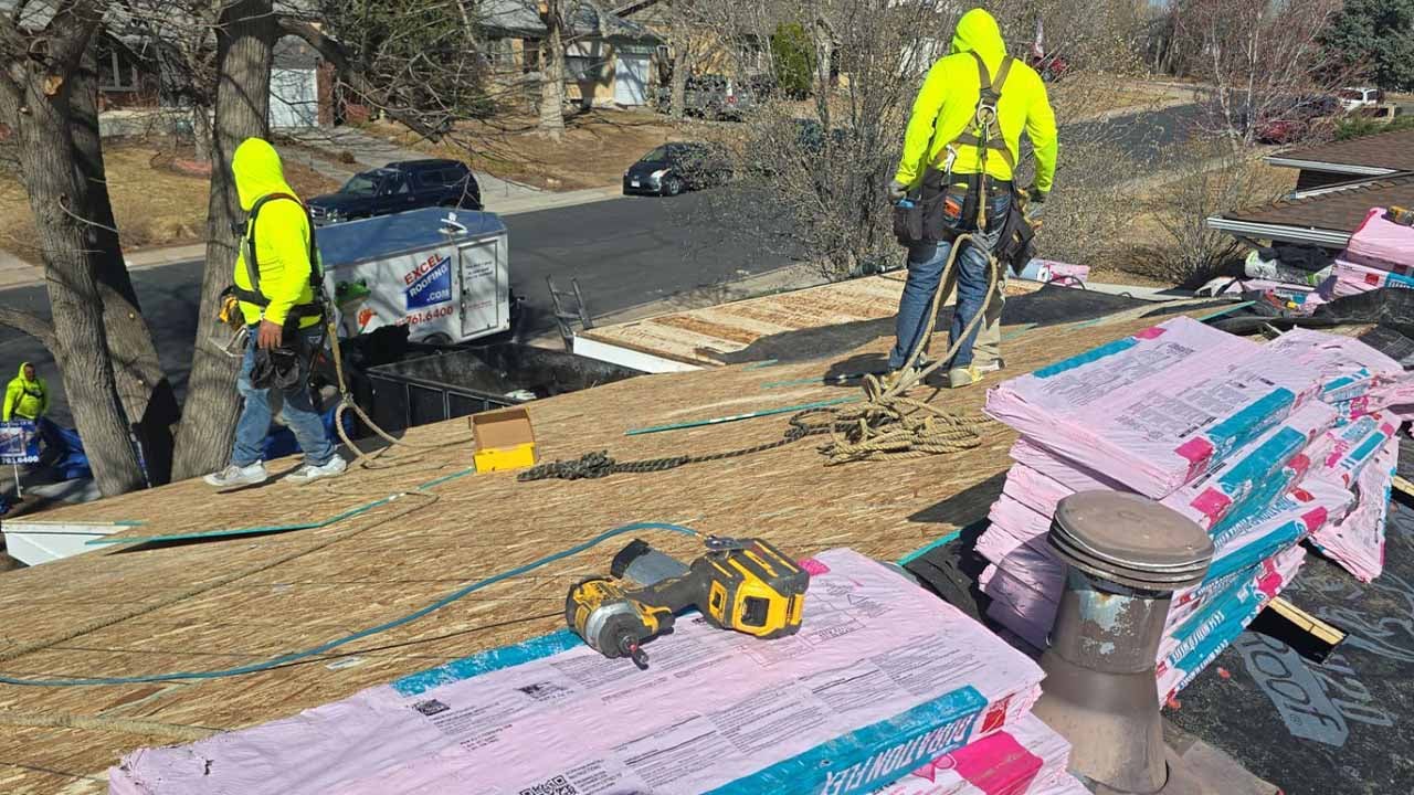 Excel Roofers tearing off a roof for replacement