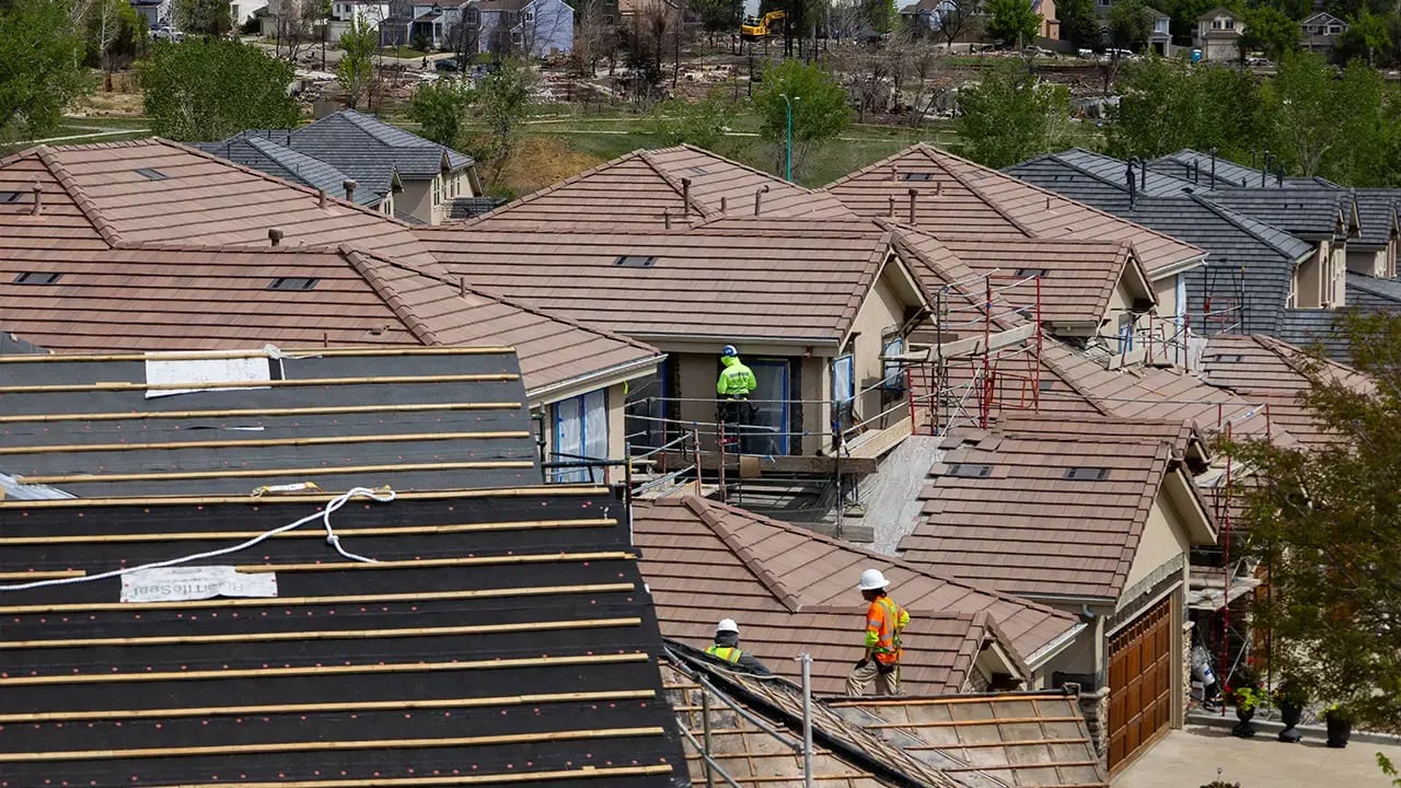 Excel Roofing contractors replacing concrete tile roofs for an HOA community in Superior Colorado