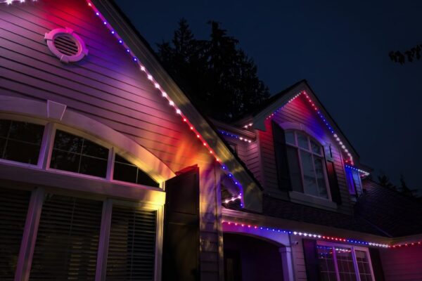 a cozy home light up with permanent holiday lighting