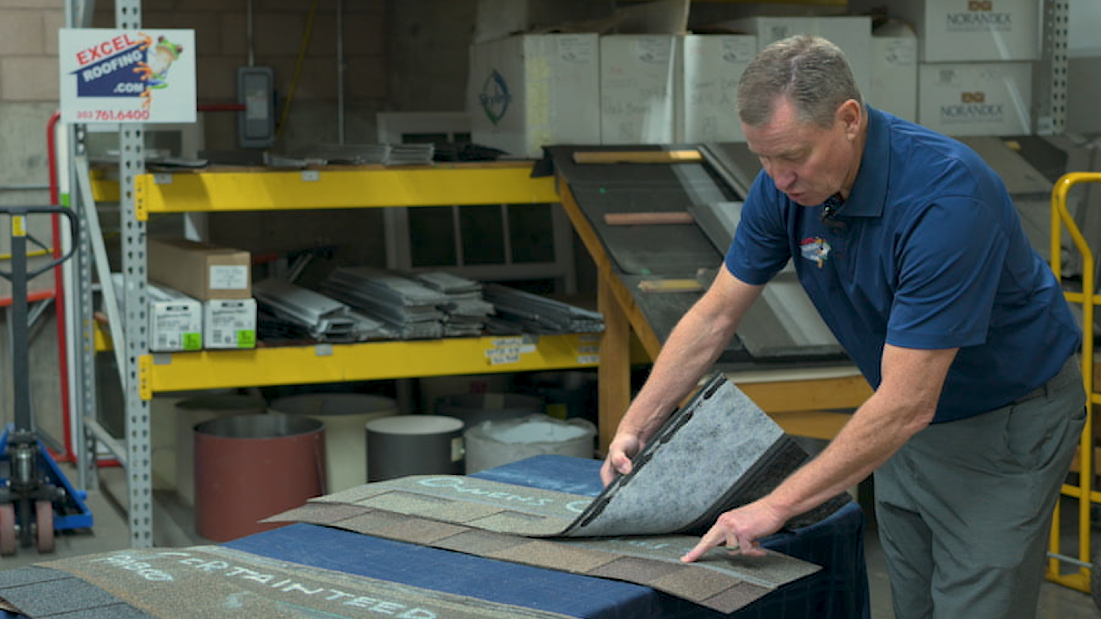 J pointing to an OC sure nail strip