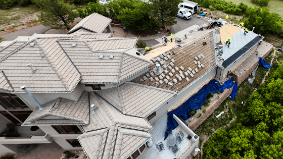 Excel Roofing team replacing a concrete tile roof