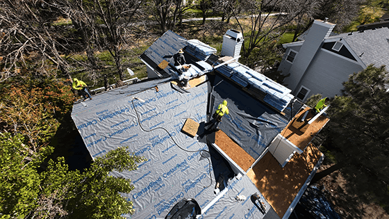 Presidential asphalt shingles being installed on a colroado home