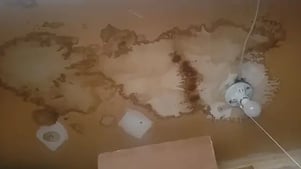 Roof leak causing damage to ceiling and electrical components