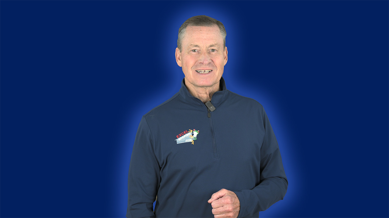 J Bretz of Excel roofing in a dark blue pull over, ready to talk about roof repair