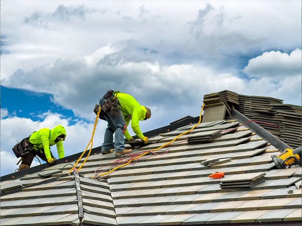 concrete tile installers working on a westlake concrete tile roof
