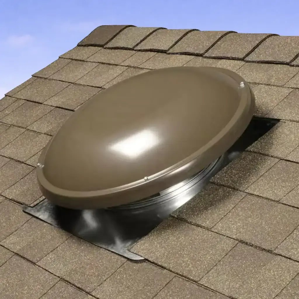 Electric roof mounted attic fan installed on shingle roof