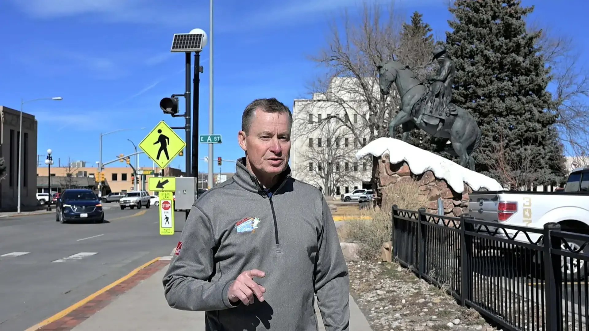 Expert Roofer J Bretz standing in front of the iconic cowboy statue in Casper Wyoming