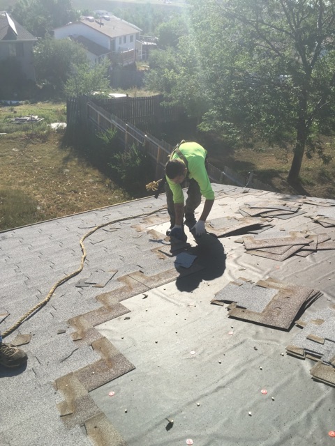 old roof getting torn off