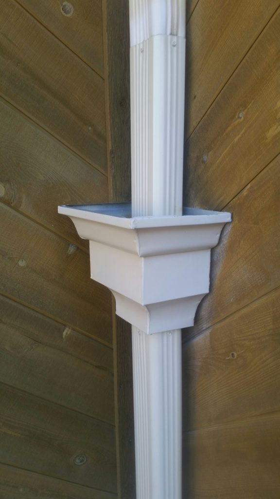 oversized downspout on a gutter