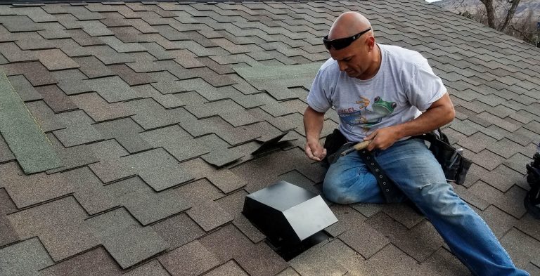 man-fixing-roof-leak-roof-repair