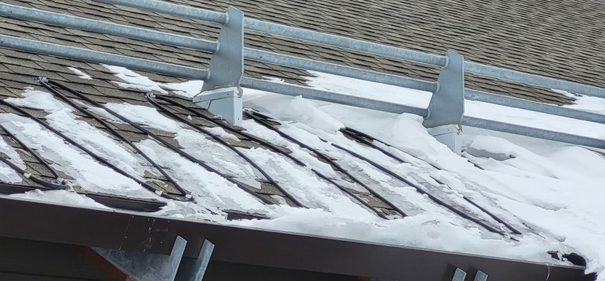 Another example of ice dam damage to the roof