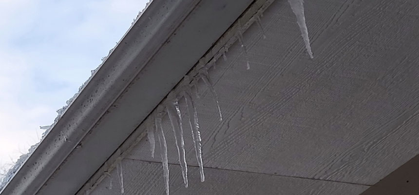 Icicles forming from an ice dam